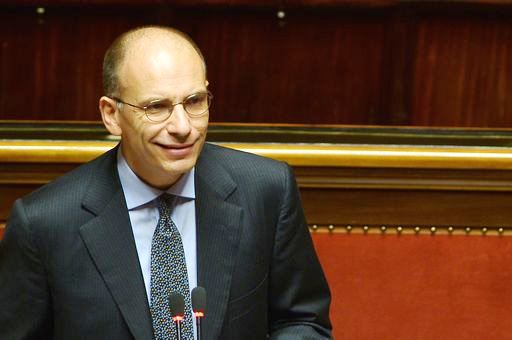 Italy's Prime Minister Enrico Letta delivers a speech on October 2, 2013 at the Senate before today's confidence vote at the Parliament. Enrico Letta warned lawmakers ahead of a crucial vote of confidence today that the country ran a "fatal" risk as Silvio Berlusconi tries to topple his government. "Italy runs a risk that could be a fatal risk. Seizing this moment or not depends on us, on a yes or a no," Letta said in his address.  AFP PHOTO / FILIPPO MONTEFORTE